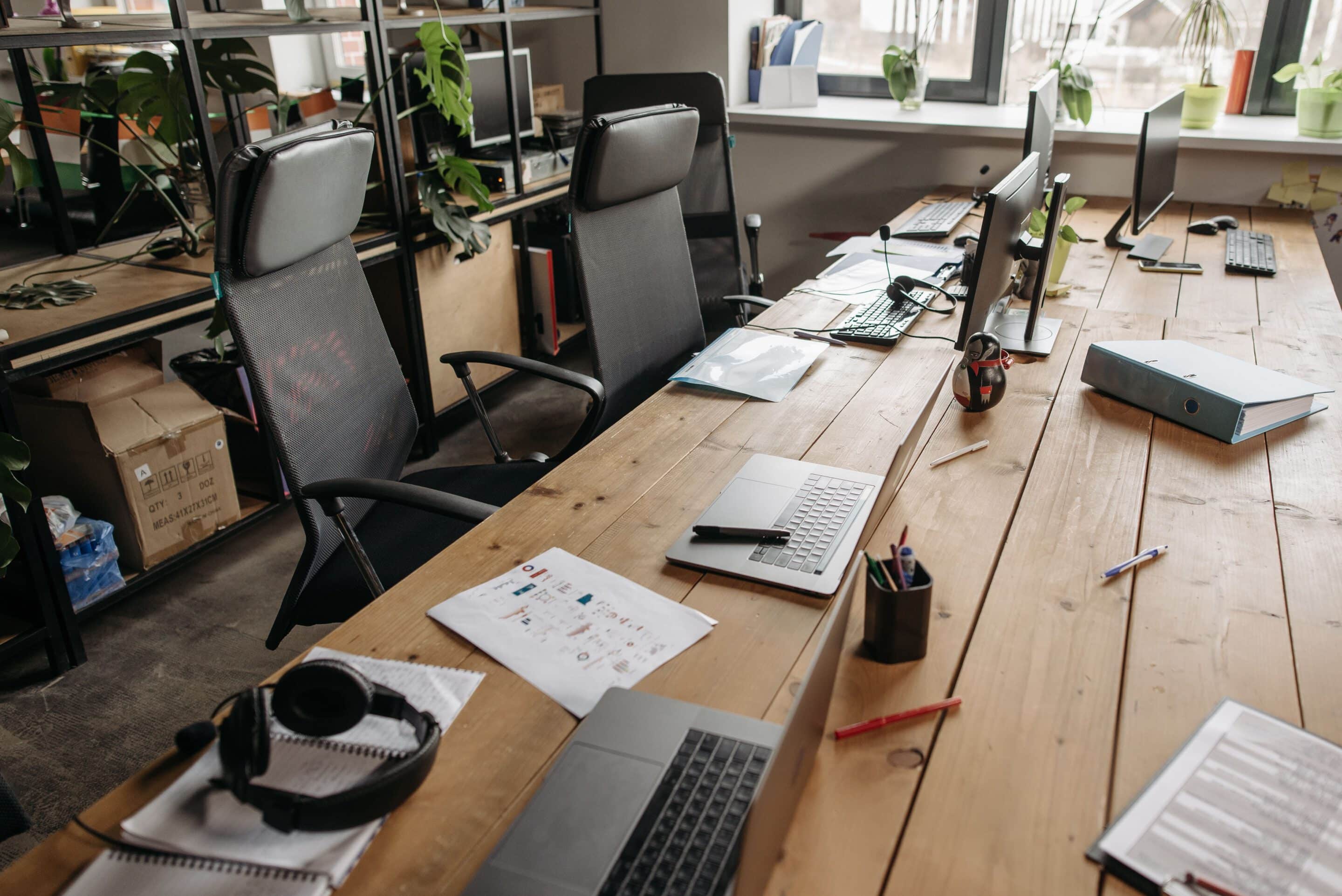 Image showing office chairs, desks and laptops.