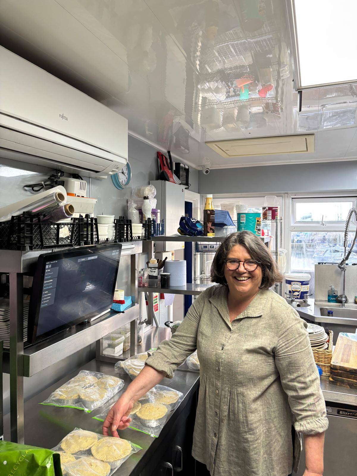 Image of Jess Harley, career coach, ready to make pies - a metaphor for stretching yourself in your career.